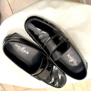 Black Hogan slip-on loafers size 9 and they fit like 9.5/10.